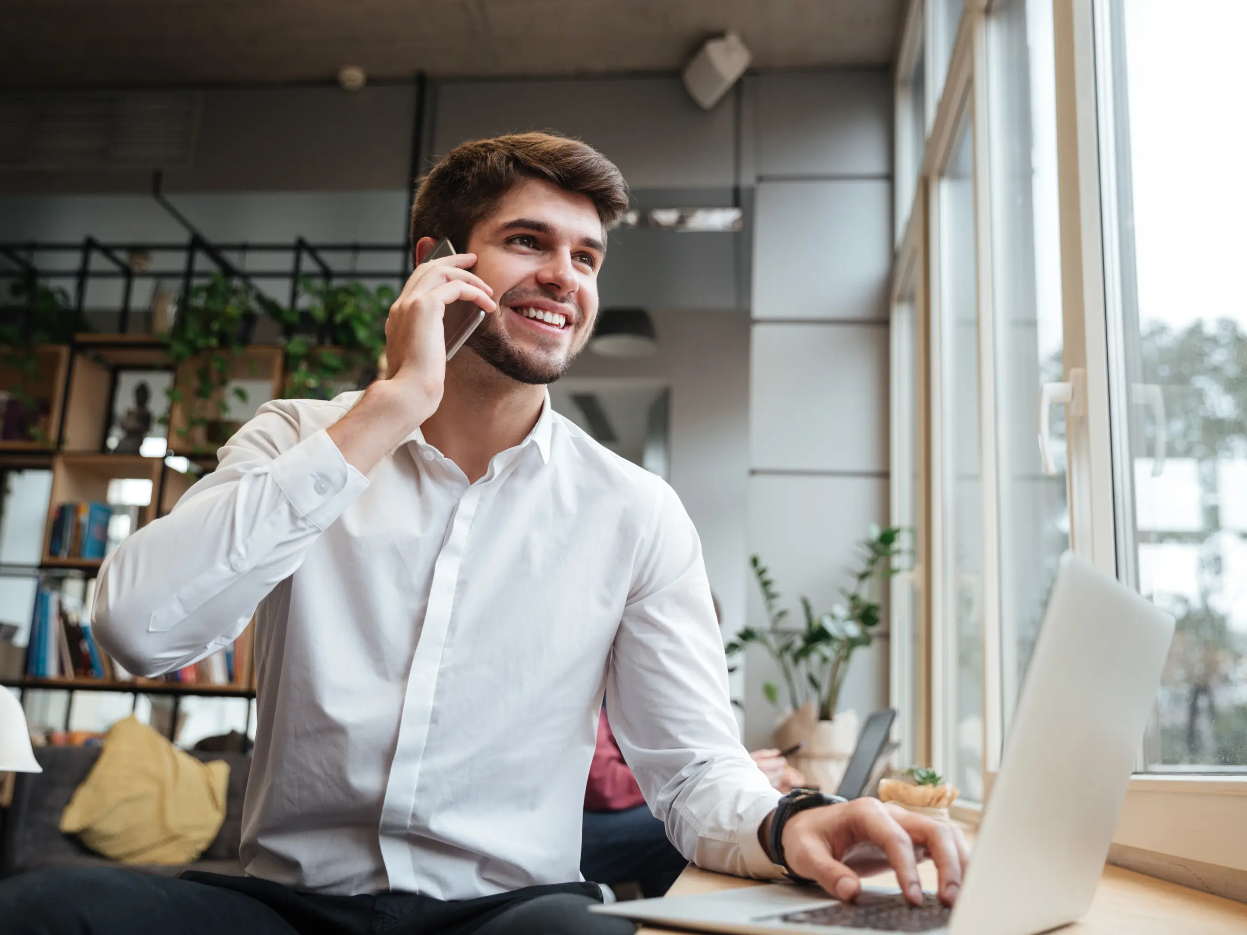 smiling businessman, laptop, electronic device