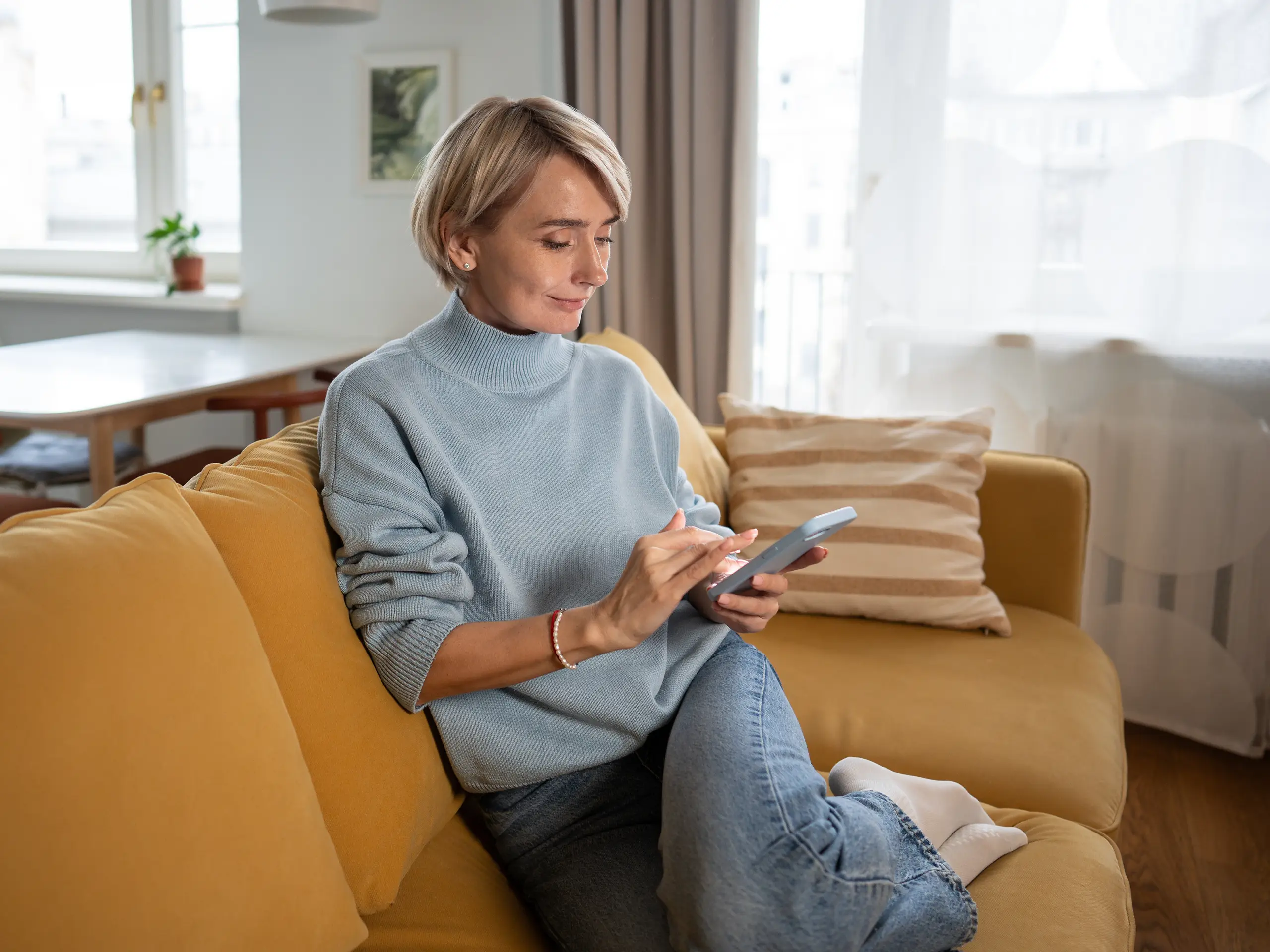 lady on the couch, electronic device, furniture, gadget, living room,